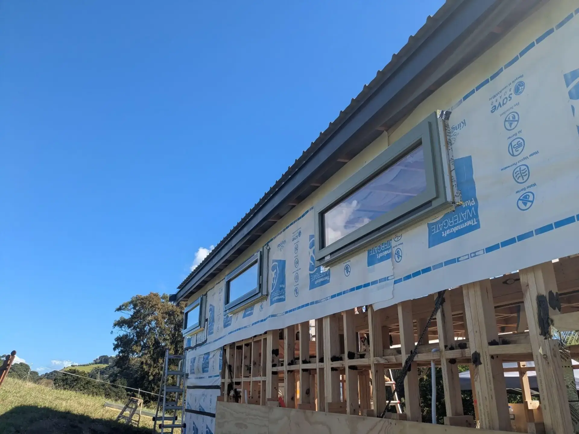 Drained cavity and building wrap behind cladding — MJones Building
